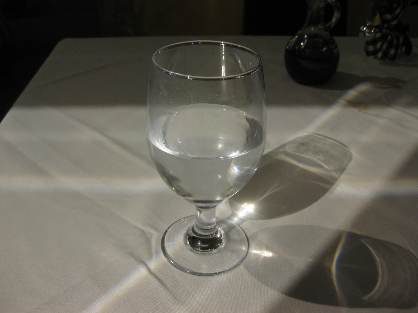 A glass of water on a table